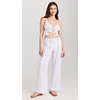 image:imageLSpace Sundown Cargo Pant Mid or High Waisted Featuring Multiple Pockets Tie Waist and Relaxed Wide Leg Fit 100 LinenWhite