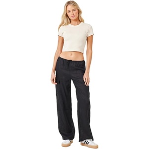 image:imageLSpace Sundown Cargo Pant Mid or High Waisted Featuring Multiple Pockets Tie Waist and Relaxed Wide Leg Fit 100 LinenBlack